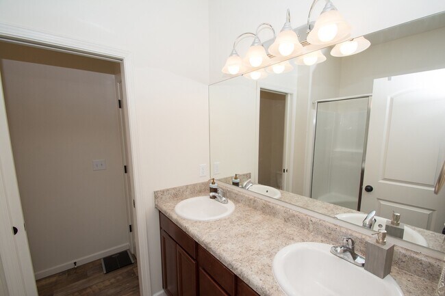 Building Photo - House with Fenced Backyard