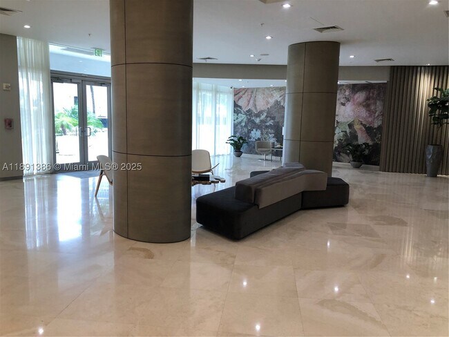 Building Photo - 10275 Collins Ave