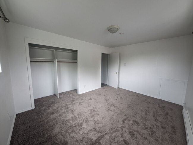 Building Photo - Cute and Cozy, Centrally Located Triplex with Yard