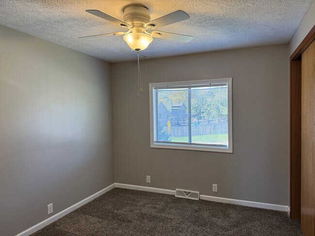 Building Photo - Bright and spacious split-entry home with a finished lower level, large yard, and plenty of updates!