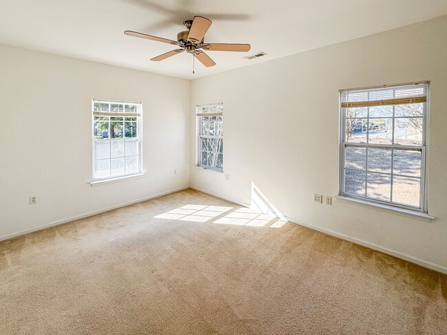 Building Photo - Introducing a charming 2-story corner unit...