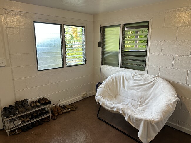 Bright light and garden views in the living room. - 2854 Booth Rd