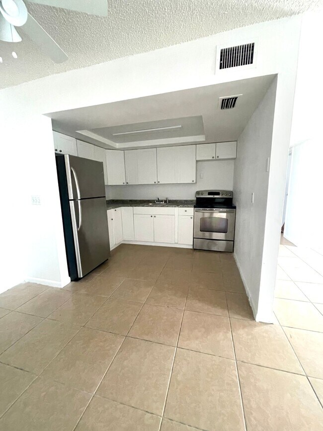 Building Photo - LARGE NEWLY RENOVATED 2 BEDROOM APARTMENTS + OFFICE Application fee is waived during move in