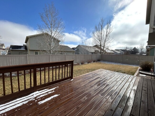 Building Photo - Spacious 5-Bedroom Home with Finished Basement and 3-Car Garage in Wellington