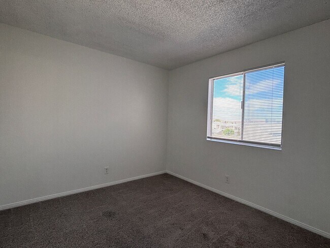 Building Photo - Charming Two-Story Townhouse with Fresh Updates & Prime Location