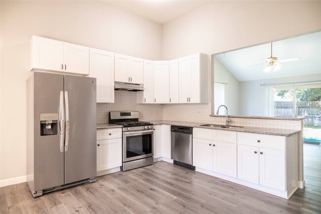 Building Photo - 17003 Enchanted Cir W