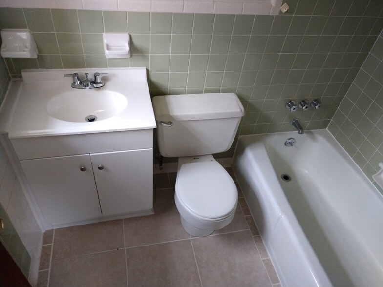New bath cabinet n sink. - 1730 River Front Dr
