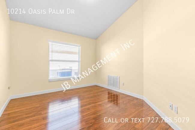 Building Photo - 10214 Oasis Palm Dr