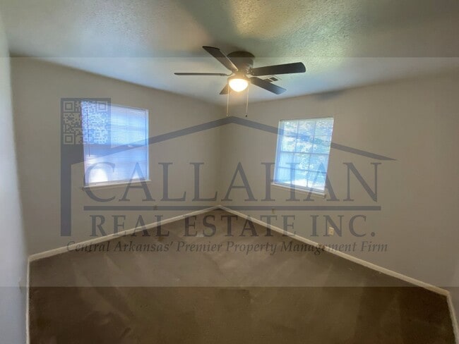 Building Photo - 8211 Woodview Dr N