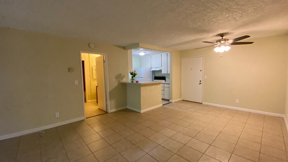 View of the front door, kitchen, and door to the bedroom and bathroom - 7777 W 91st St