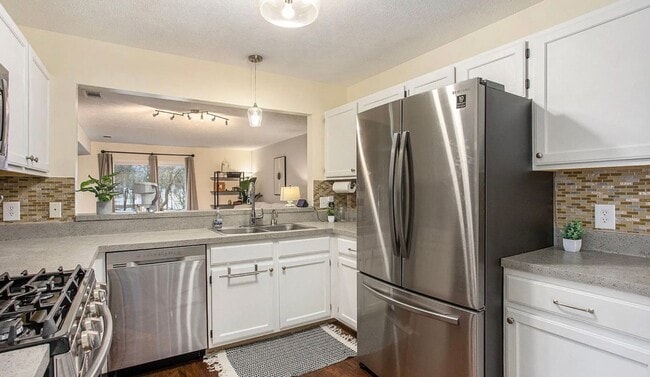 Building Photo - Charming 3-Bedroom End Unit Condo – Prime ...