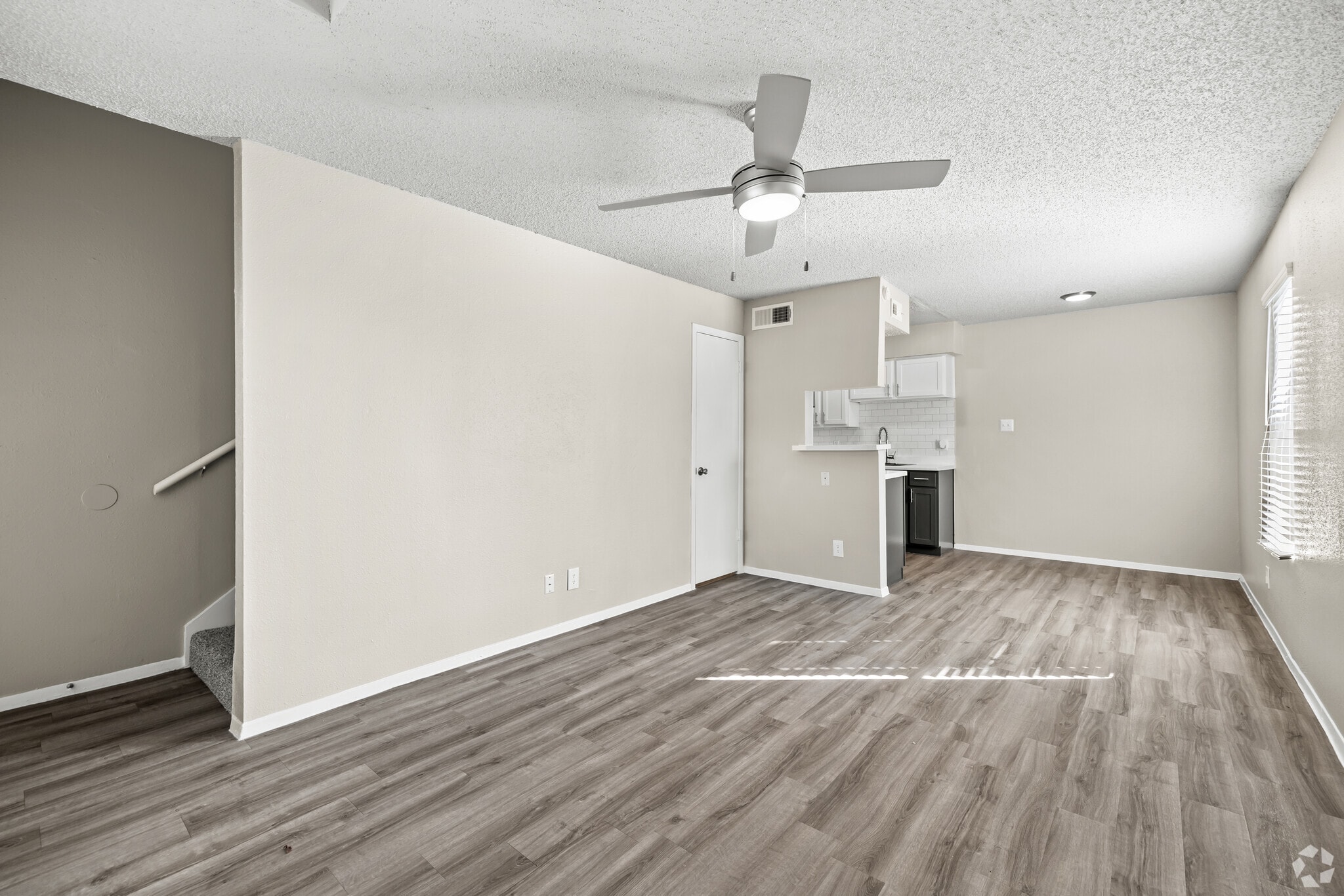 1BR, 1.5BA - 700SF - Living - Peaks at Universal City