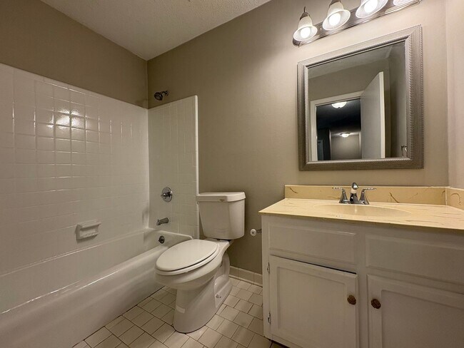 Building Photo - Four Bedroom Townhome Available Now