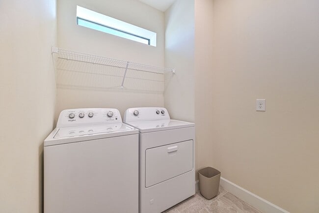 Building Photo - **Coach Home w/ Private Pool in Esplanade Lake Club **