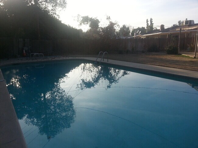 Building Photo - Contemporary Home with a pool near Bullard High School Fresno, CA