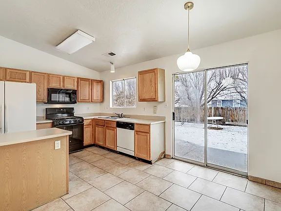 Building Photo - "Spacious 4-Bedroom Gem on Quartz Dr – Your Ideal Albuquerque Retreat!"