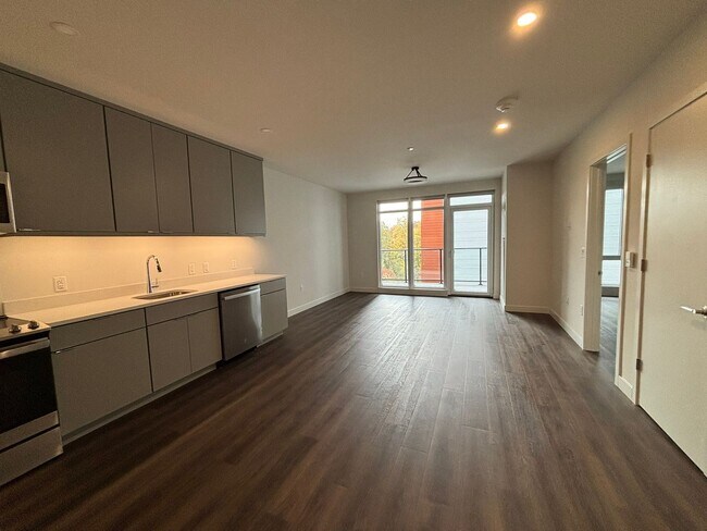 Building Photo - ONE25: Pet-Friendly 1-Bed with Balcony, Do...
