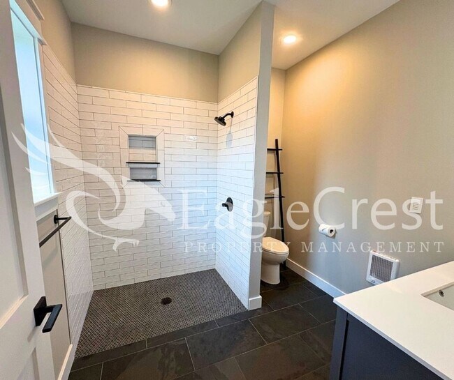 Building Photo - Contemporary Home With A Covered Patio & Quartz Countertops