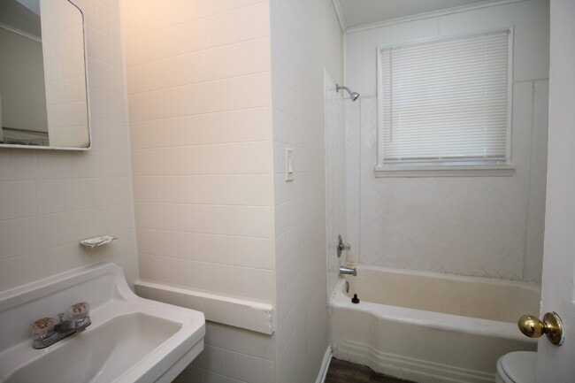 Building Photo - 2BR Cottage Home with LVP Flooring Throughout, Bonus Sunroom, Covered Parking & Low-Maintenance L...