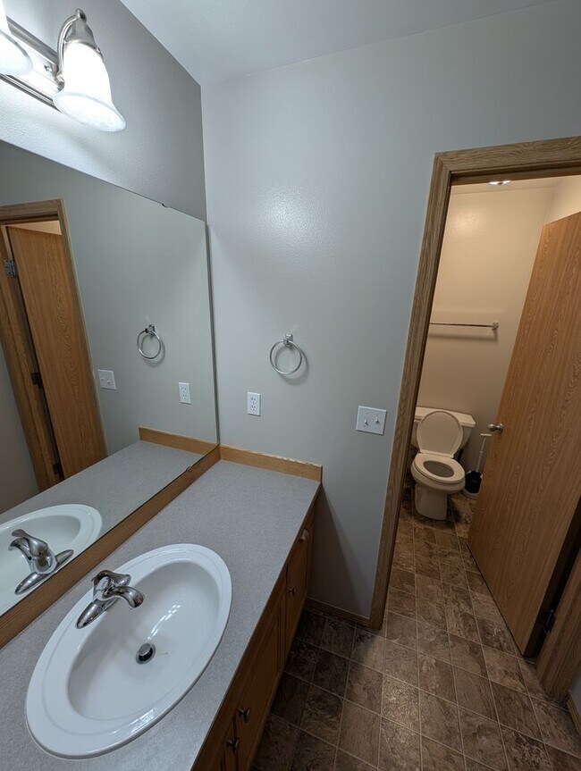 Building Photo - A Gardeners Oasis! 3 Bedroom Townhome for ...
