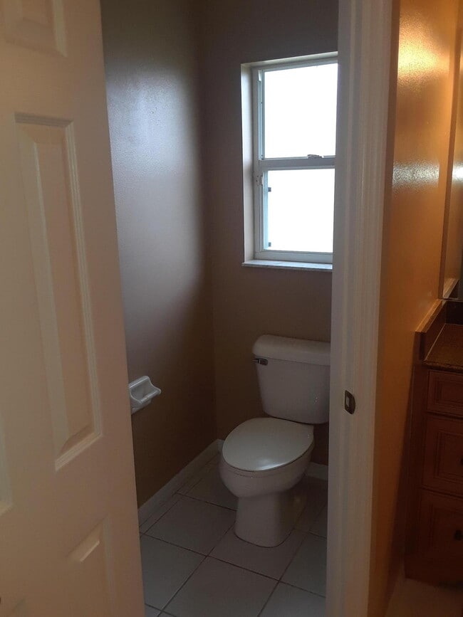 Building Photo - 6444 NW Hacienda Ct