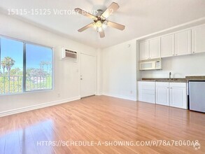 Building Photo - Updated top floor Studio apartment located...