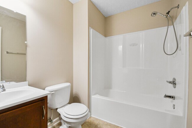 Building Photo - Pet Friendly Three Bedroom with Bonus!
