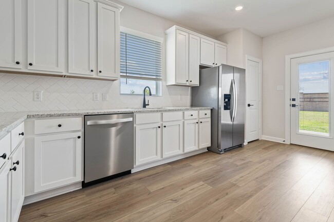 Building Photo - 1023 Whispering Winds Dr