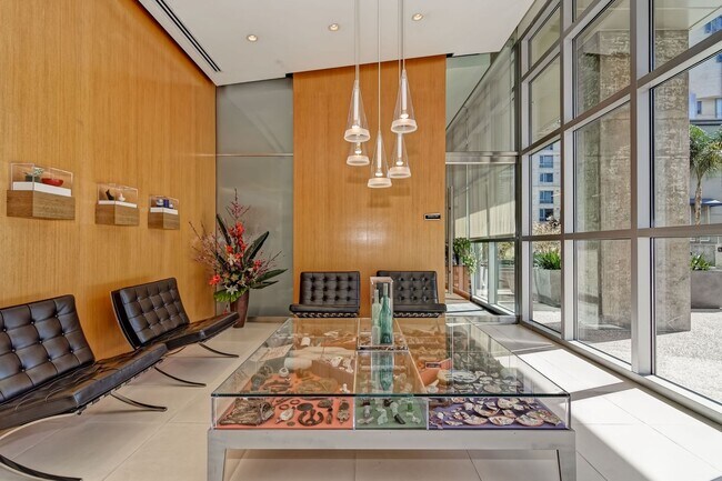 Building Photo - Modern Downtown Condo in Premier High-Rise...