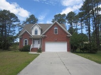 Building Photo - Live Where Others Vacation | 4BR Unique Home in the Gated Community of Fairfield Harbour!