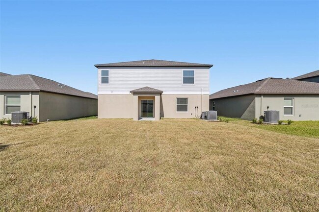 Building Photo - 1712 Tropical Oasis Ave