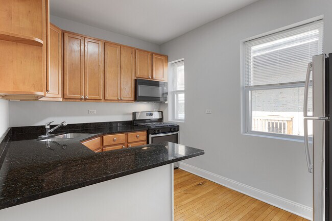Building Photo - 7328 N Damen Ave