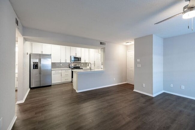 Building Photo - Spacious 2-Bedroom Elite Apartment with Private Balconies & Washer/Dryer