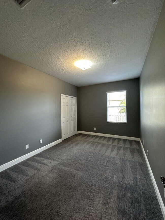 Building Photo - Spacious 4-Bedroom Home in Melbourne, FL w...
