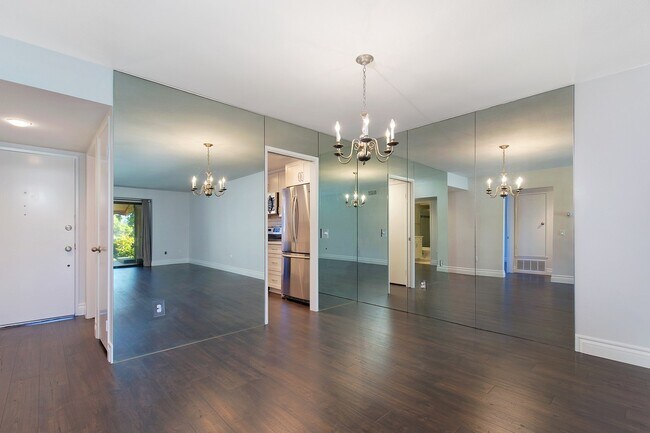 Building Photo - Lake and Golf Course View- Remodeled Condo w/ 2 Car Garage!