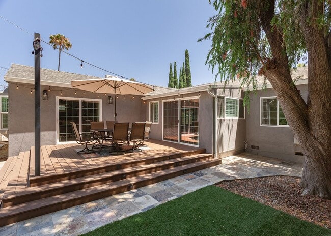 Building Photo - *Unfurnished* Gorgeous 4-Bed Oasis with Po...