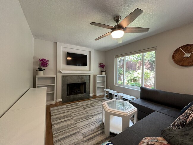 Building Photo - Spacious 3-Bedroom Home with Two Living Areas, Private Balcony, Fireplace & Attached 2-Car Garage