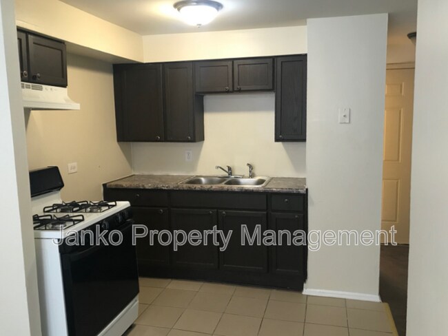 Building Photo - 6437 S Evans Ave
