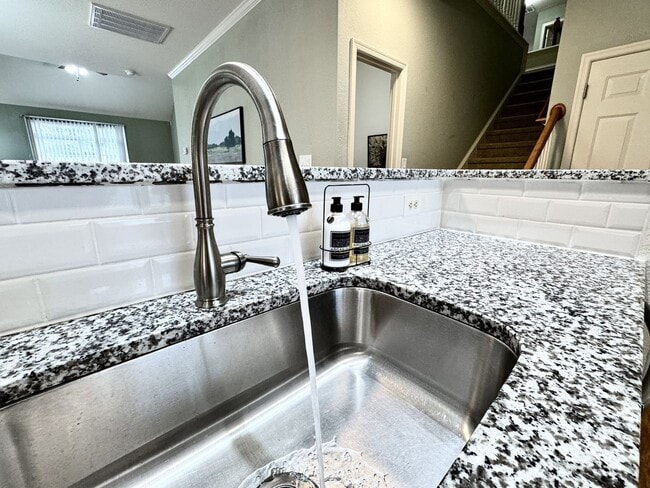 Building Photo - READY NOW!! End-Unit Loft-Style Condo w/1s...