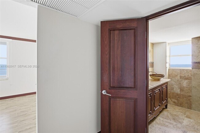 Building Photo - 5555 Collins Ave