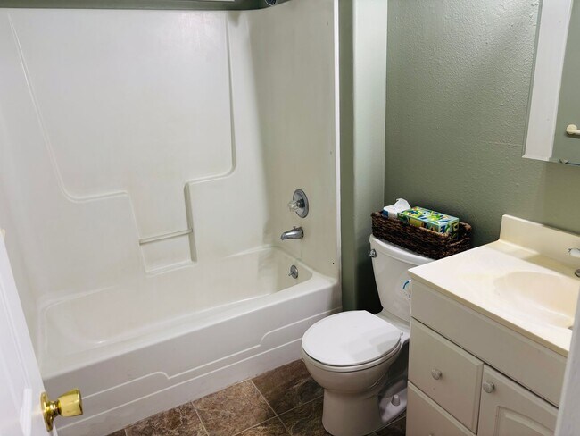 Building Photo - Bright 2 BR Carter Park Living with Fireplace, Carport, and Tons of Storage!