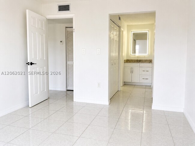 Building Photo - 6095 W 18th Ave