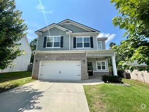 Building Photo - Whispering Pines 4 Bedroom 3.5 Bathroom Re...