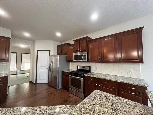 Building Photo - 5000 Merrimac Lane North