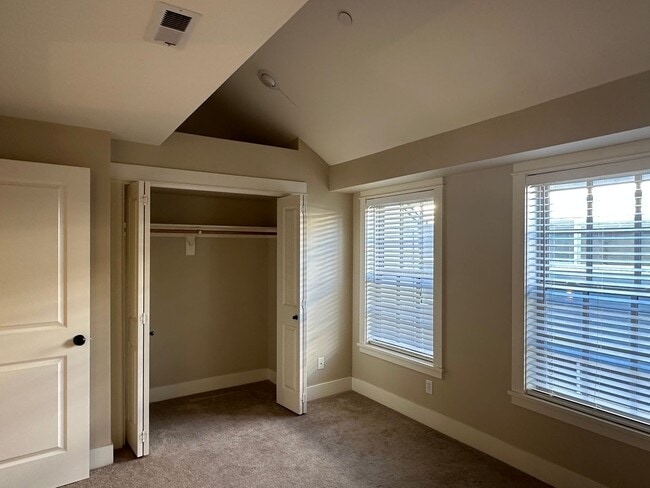 Building Photo - Stunning Tri-Level Condo with Open Concept Layout, Loft, and Private Patio!