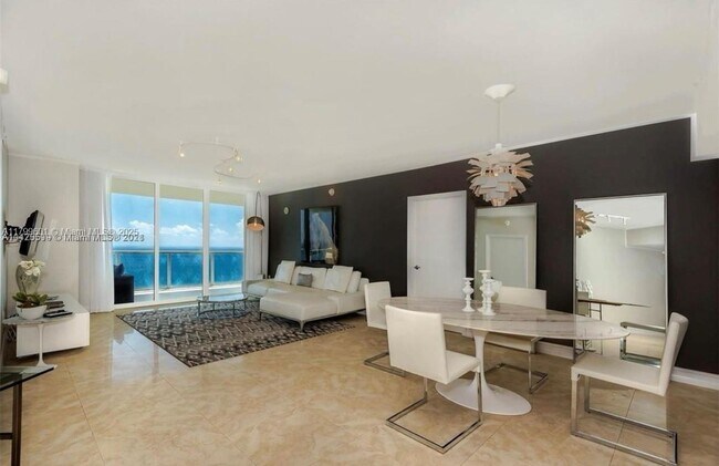 Building Photo - 16699 Collins Ave