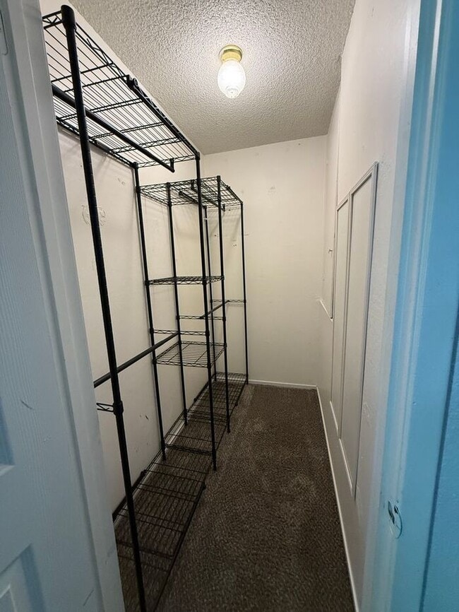 Building Photo - 2-Bedroom Townhouse Near Shopping, Dining & Freeway Access