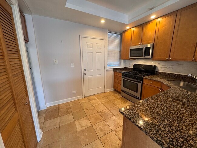 Building Photo - 1342 W Estes Ave