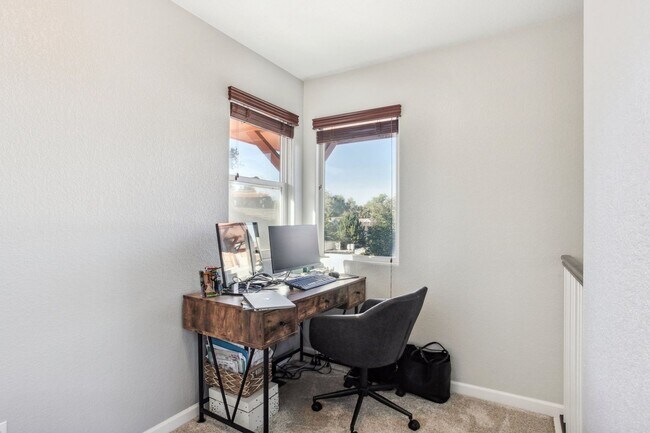 Building Photo - Arvada Townhome with Serene Lake Views