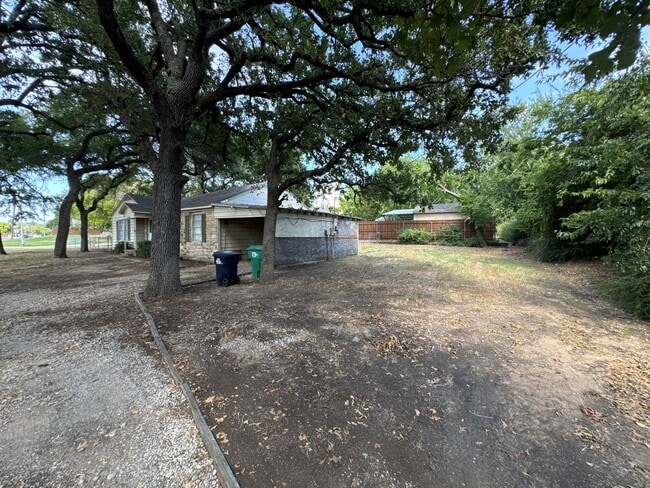 Building Photo - Denton Charmer with Big Yard, Carport & Flexible Living Space
